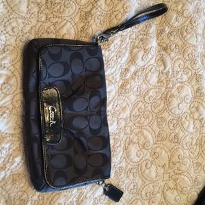 Black fabric Coach wristlet